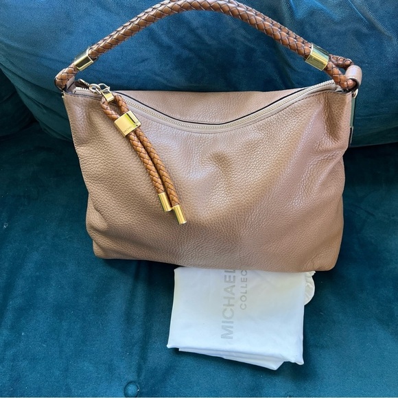 MICHAEL KORS COLLECTION
Skorpios Desert Tan Pebbled Leather Hobo
Bag $79… - Picture 1 of 16